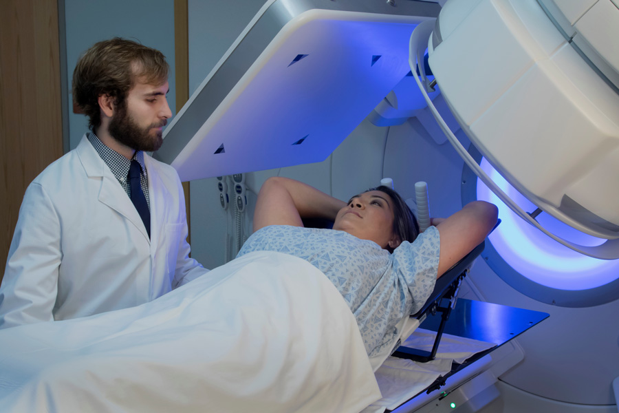 Woman undergoing breast radiation therapy