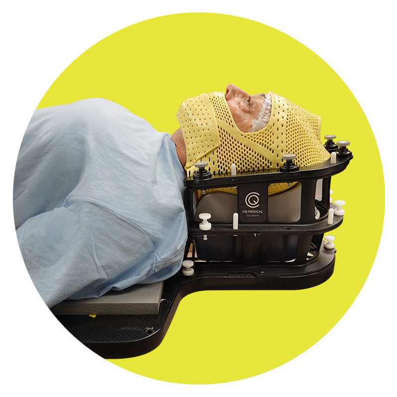 patient wearing thermoplastic mask