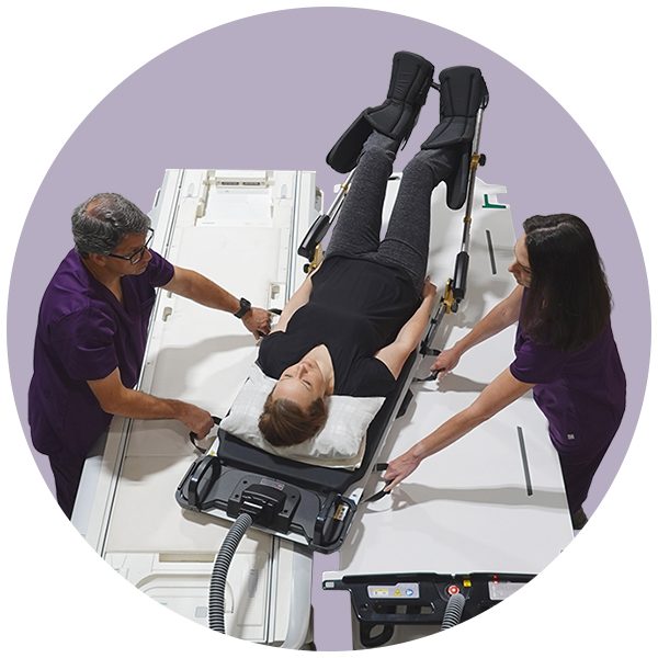 immobilized patient transferring from imaging to treatment