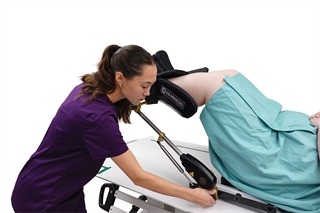 Therapist adjusting Alpine Stirrup